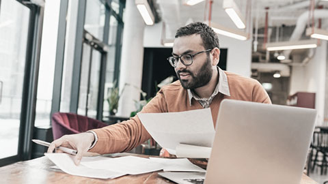 financial advisor checking documents